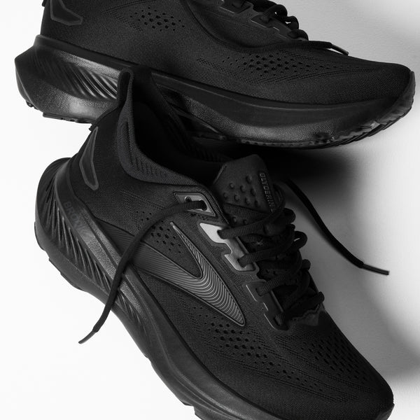 brooks men's glycerin 23 running shoe in black/black/ebony pair view