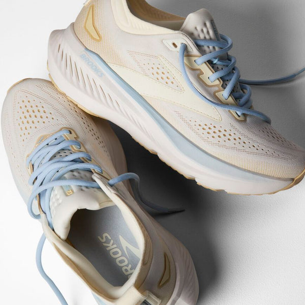 brooks women's glycerin 23 running shoe in coconut/sand/skyway pair view